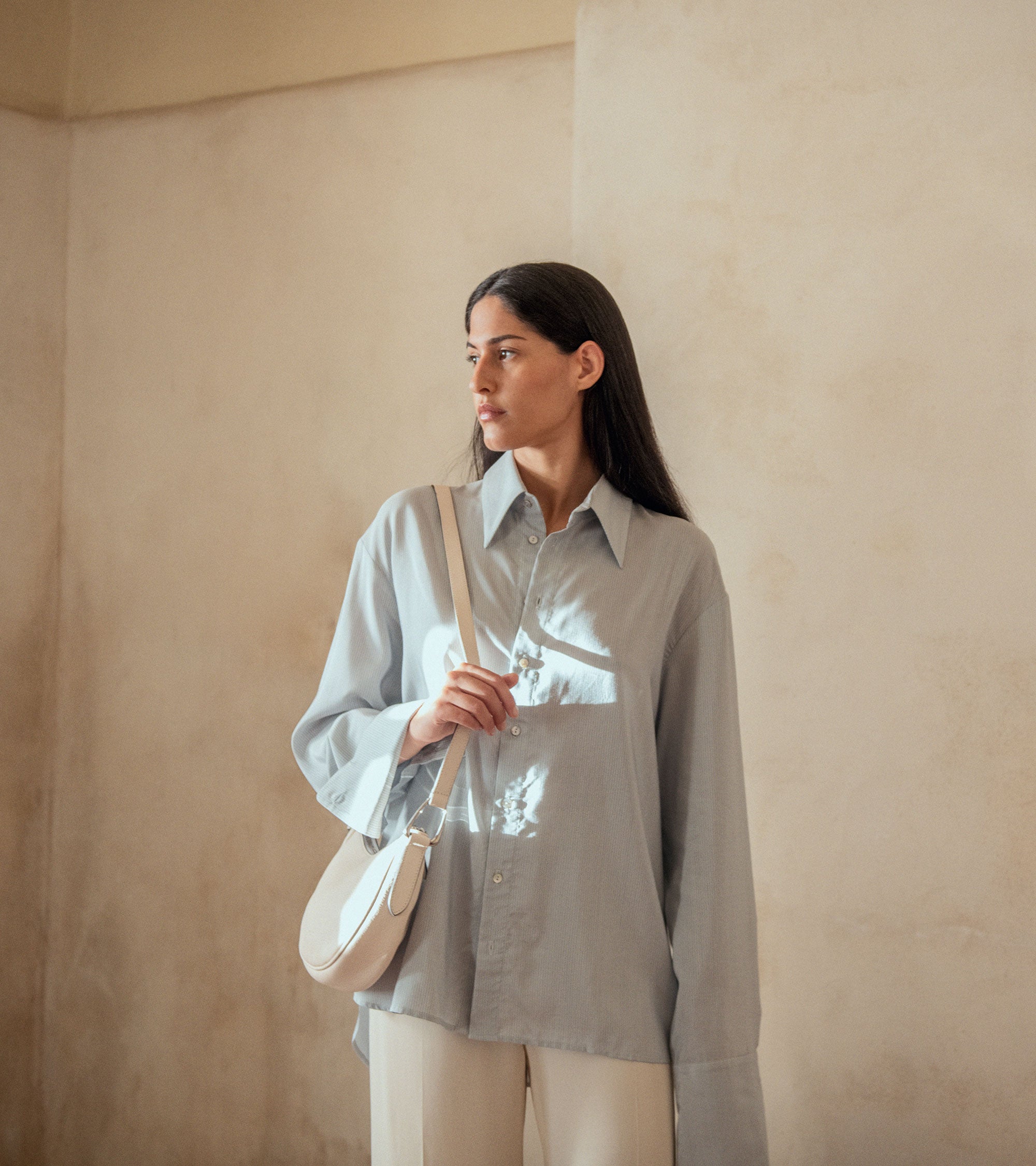 Petit sac bandoulière Madeleine en cuir de taurillon grainé